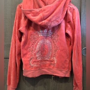 Y2K Juicy Couture peach velour tracksuit zip-up hooded jacket.